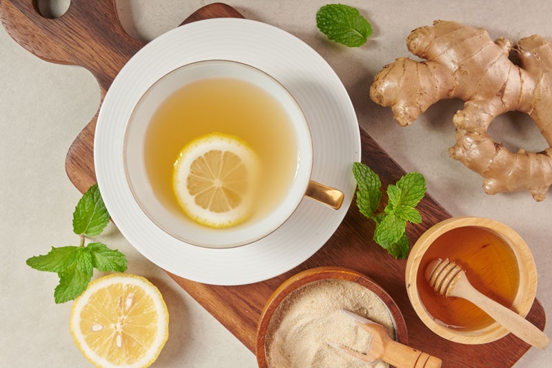 cup of tea with lemon, ginger and honey