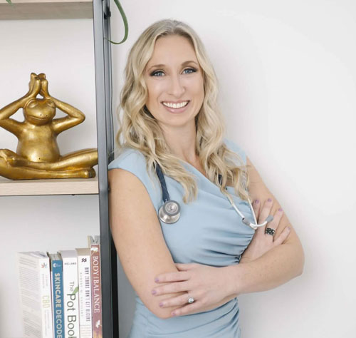 Blonde woman smiling wearing stethoscope