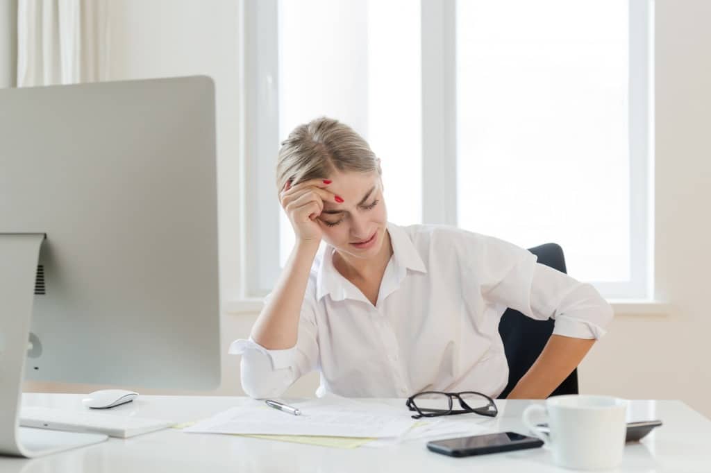 sad-unhappy-woman-suffering-from-a-stomachache-picture-id1017634266 - Naturally Dr. Sue Wellness
